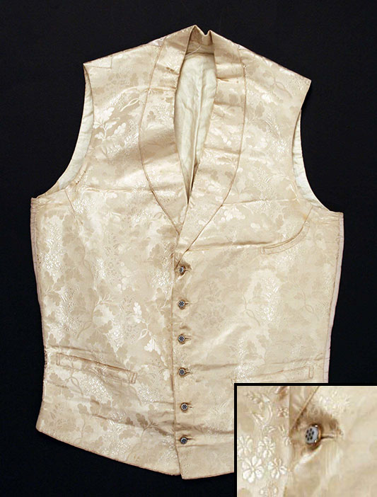 Waistcoat with similar type of glass button embellishment but with flower inset, not a swirled inset (c. 1860s) 